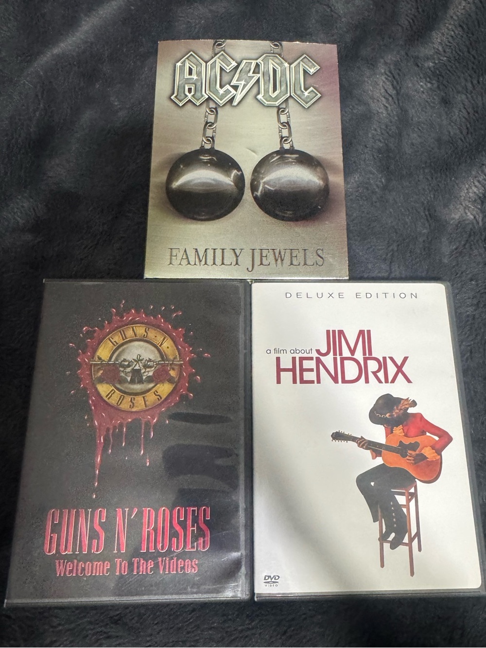 Lot of 3 Classic Rock Music DVDs: AC/DC, Guns N' Roses, & Jimi Hendrix